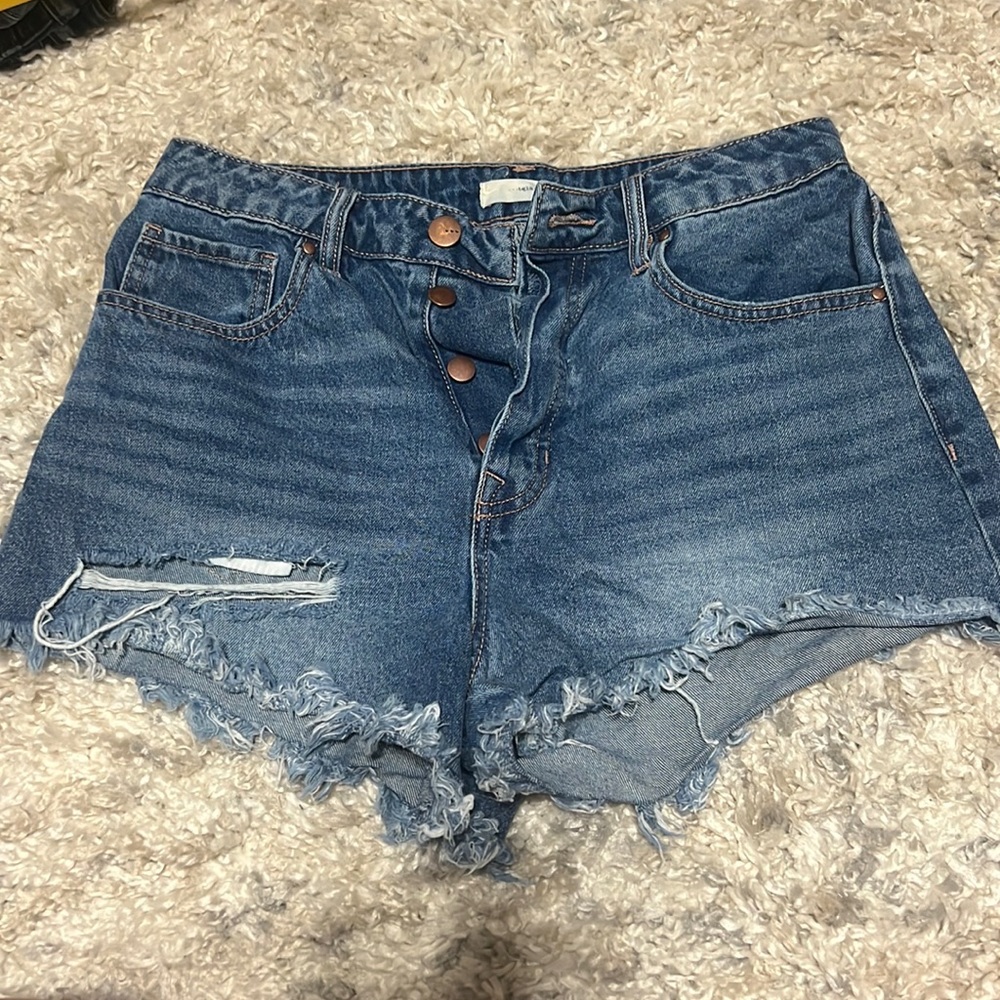 TGLA size 27 medium wash denim cut off shorts